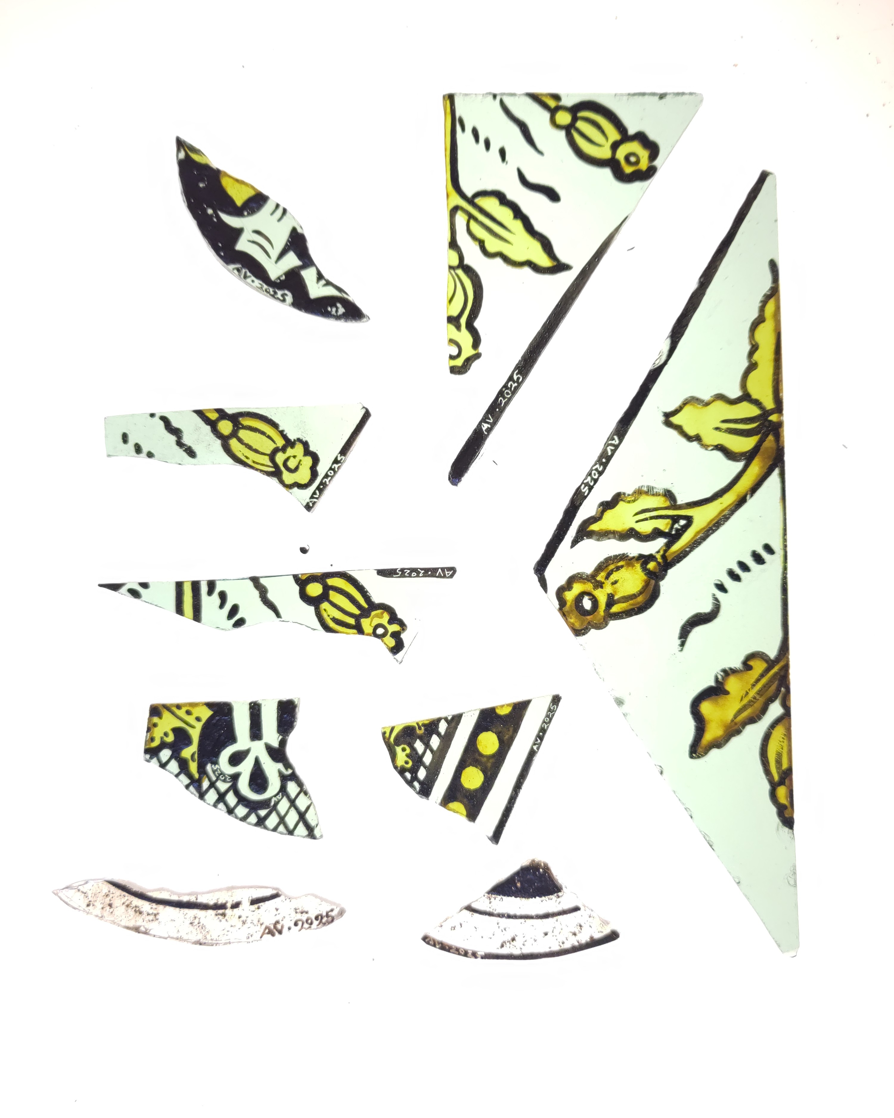 A series of photos showing the progressive cleaning of a medieval geometric panel.